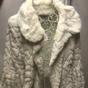 Luxurious Alberto Makali short coat perfect for a night out.